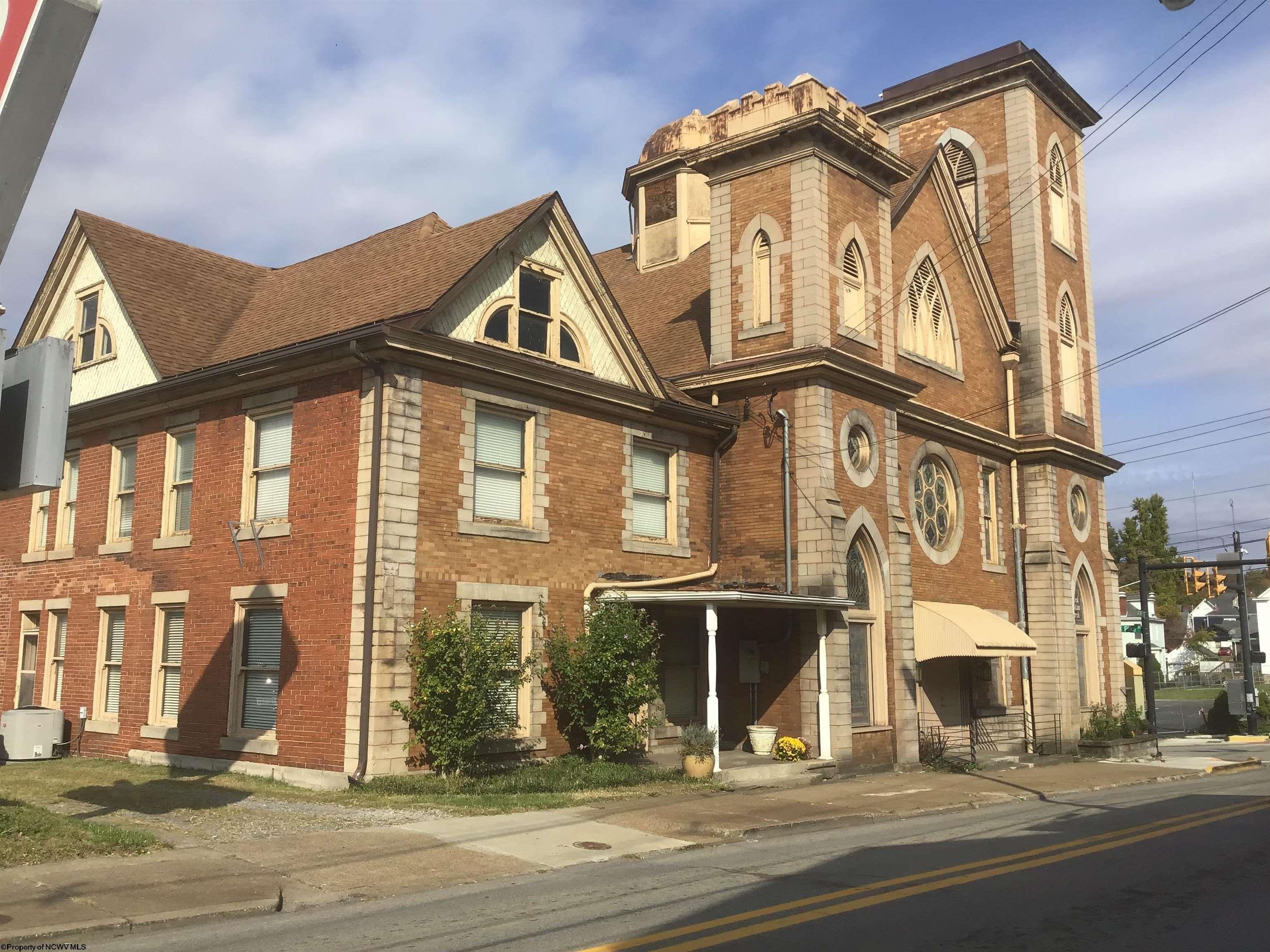 Historic 1906 brick-and-stone church at 114 S Chestnut Street, downtown Clarksburg, West Virginia