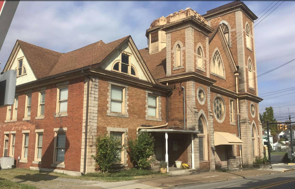 Historic 1906 brick-and-stone church at 114 S Chestnut Street, downtown Clarksburg, West Virginia